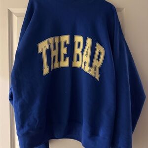 Blue Sweatshirt with Yellow Lettering